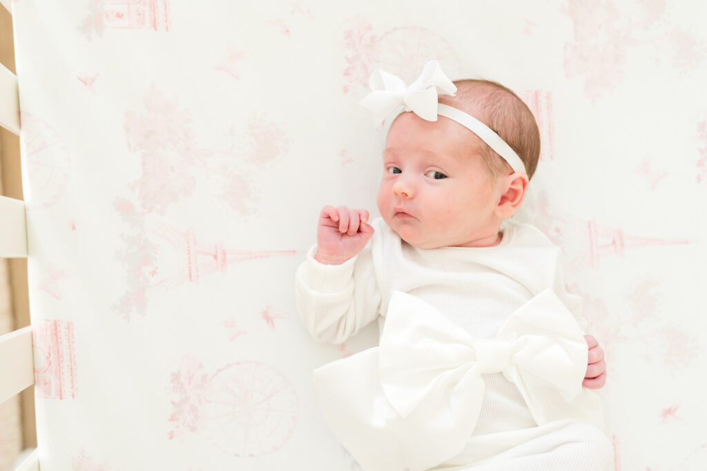 Austin newborn peacefully sleeping on a soft blanket, captured in a natural and timeless newborn photography session.