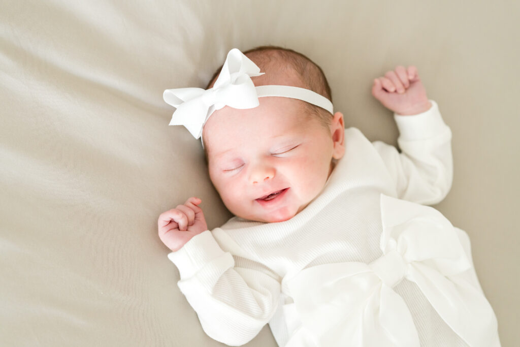 Smiling baby for their newborn session in Austin, Texas.