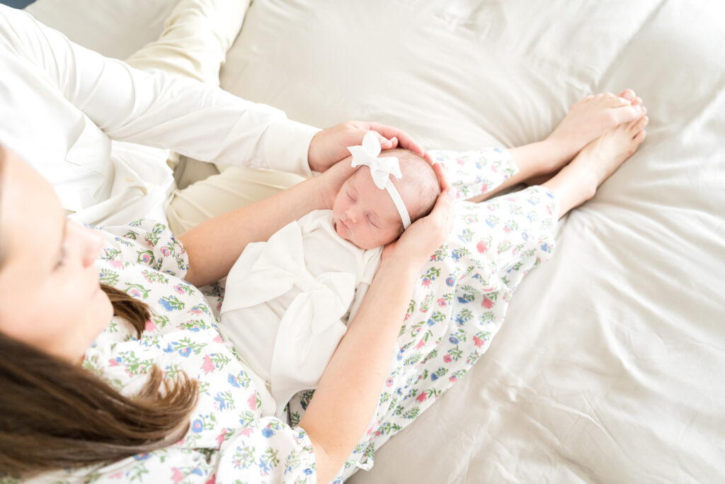 Candid newborn portrait in an Austin home, showing soft baby details and natural light.