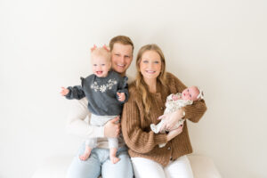Family with a newborn having a photo session in Austin.