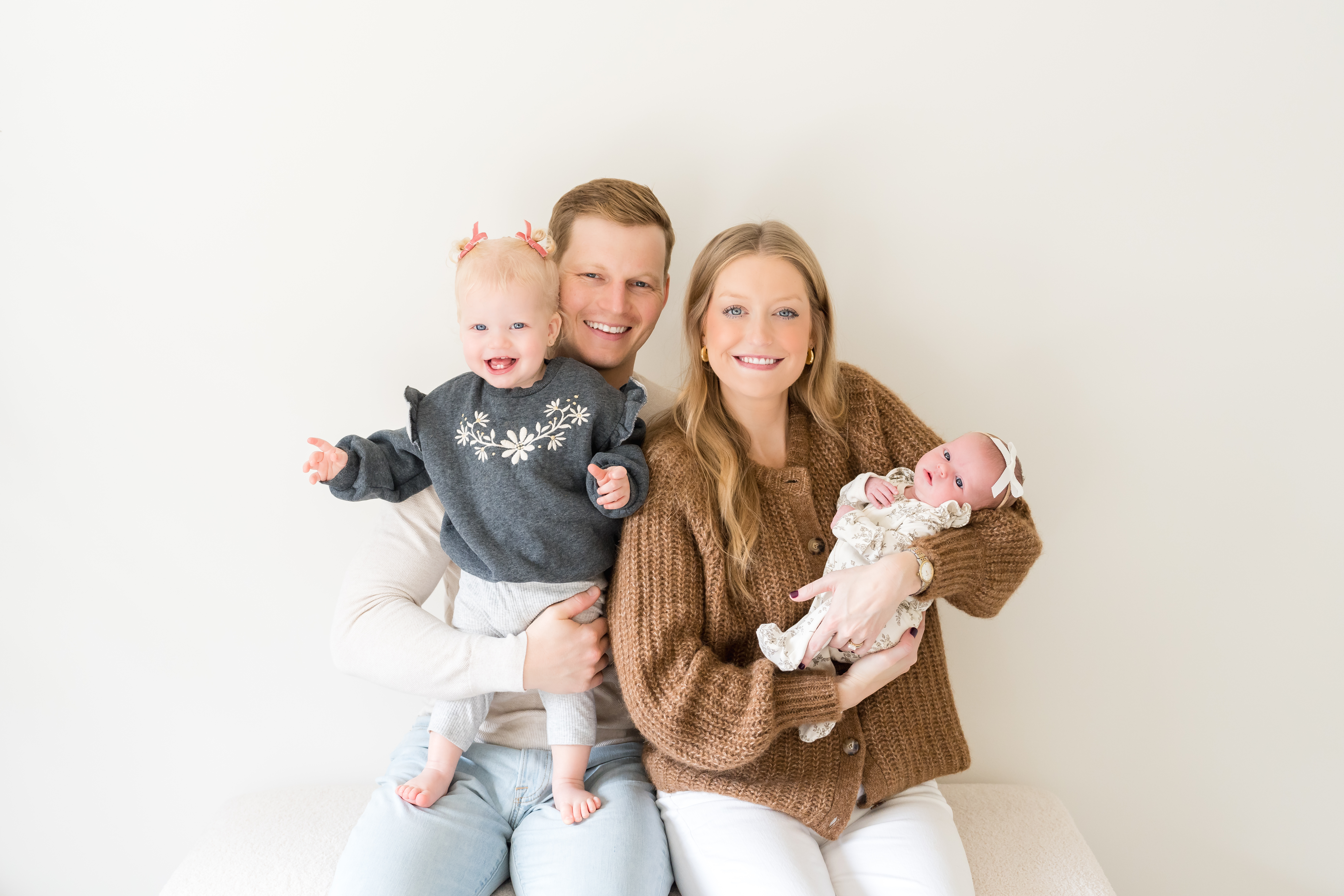 Family with a newborn having a photo session in Austin.