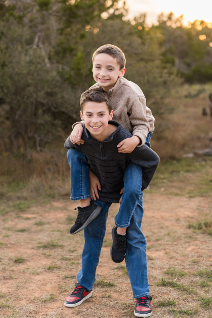 Two brothers having fun while they have their photos taken in Austin