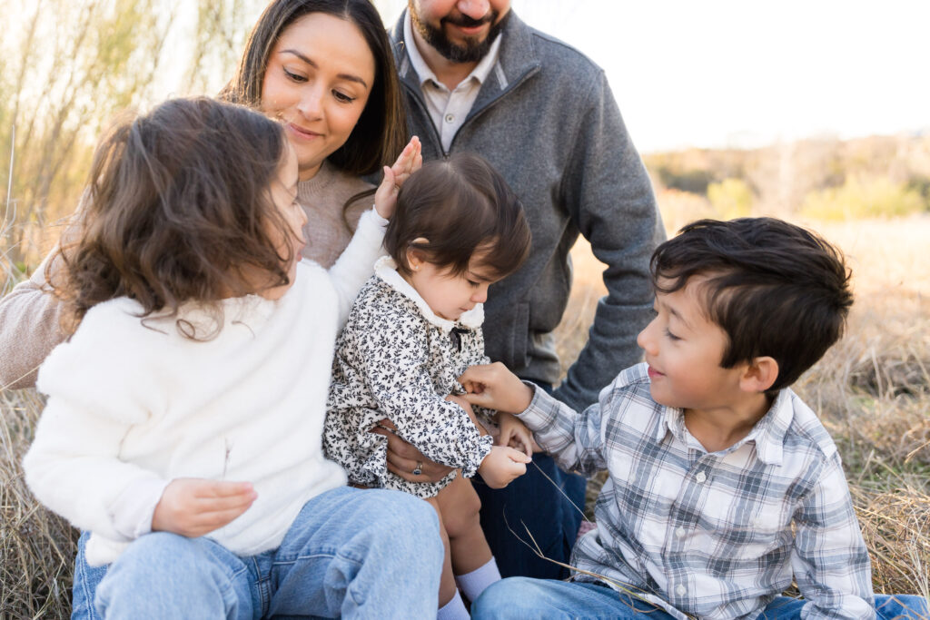 A family of five having their yearly family photo session.