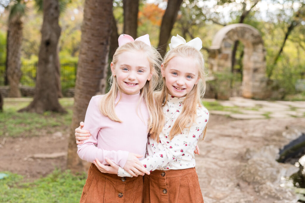 Sisters having their photo taken by Alissa Cordoba at Mayfield Park.