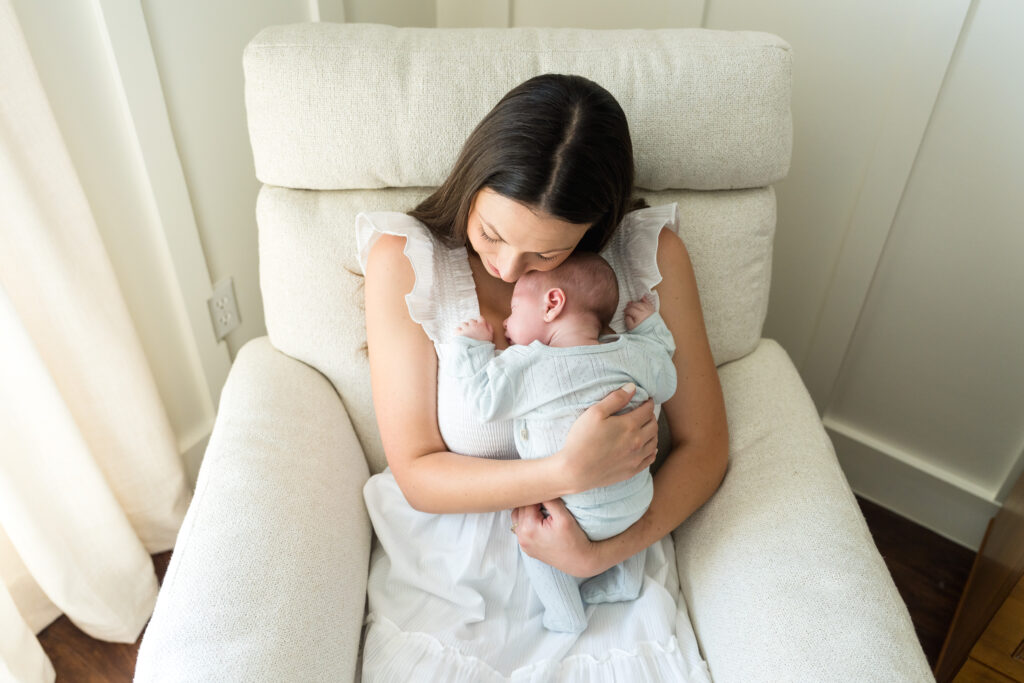 Lifestlye newborn photography documenting a new mom with her baby boy.