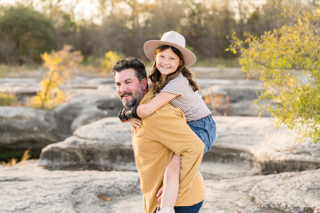 A father and daughter having fun at McKinney Park.