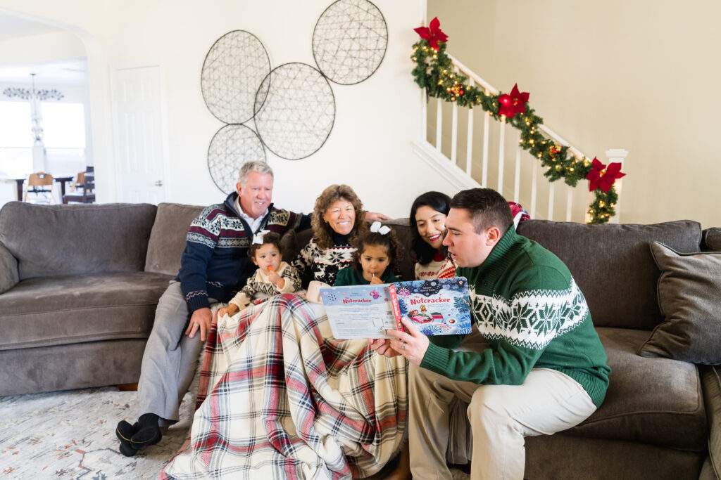Family cuddled together during a December family photo session in Austin
